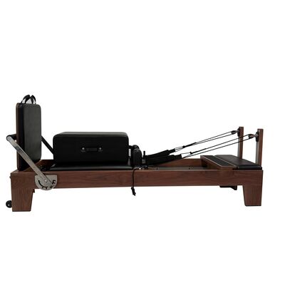 High stability Pilates Reformer apparatus supporting a wide range of Pilates exercises targeting core muscles and overall body fitness
