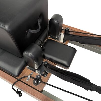 High stability Pilates Reformer apparatus supporting a wide range of Pilates exercises targeting core muscles and overall body fitness